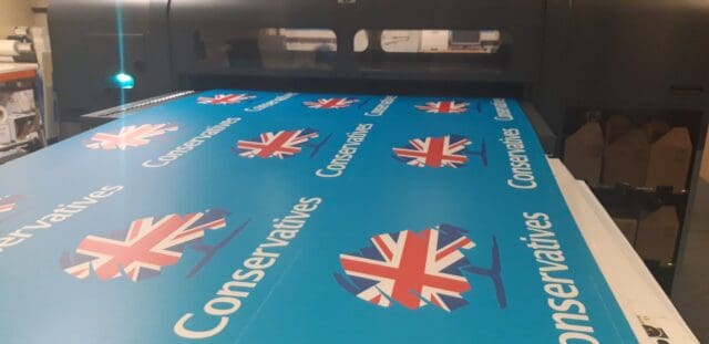 Conservative campaign boards on a printer